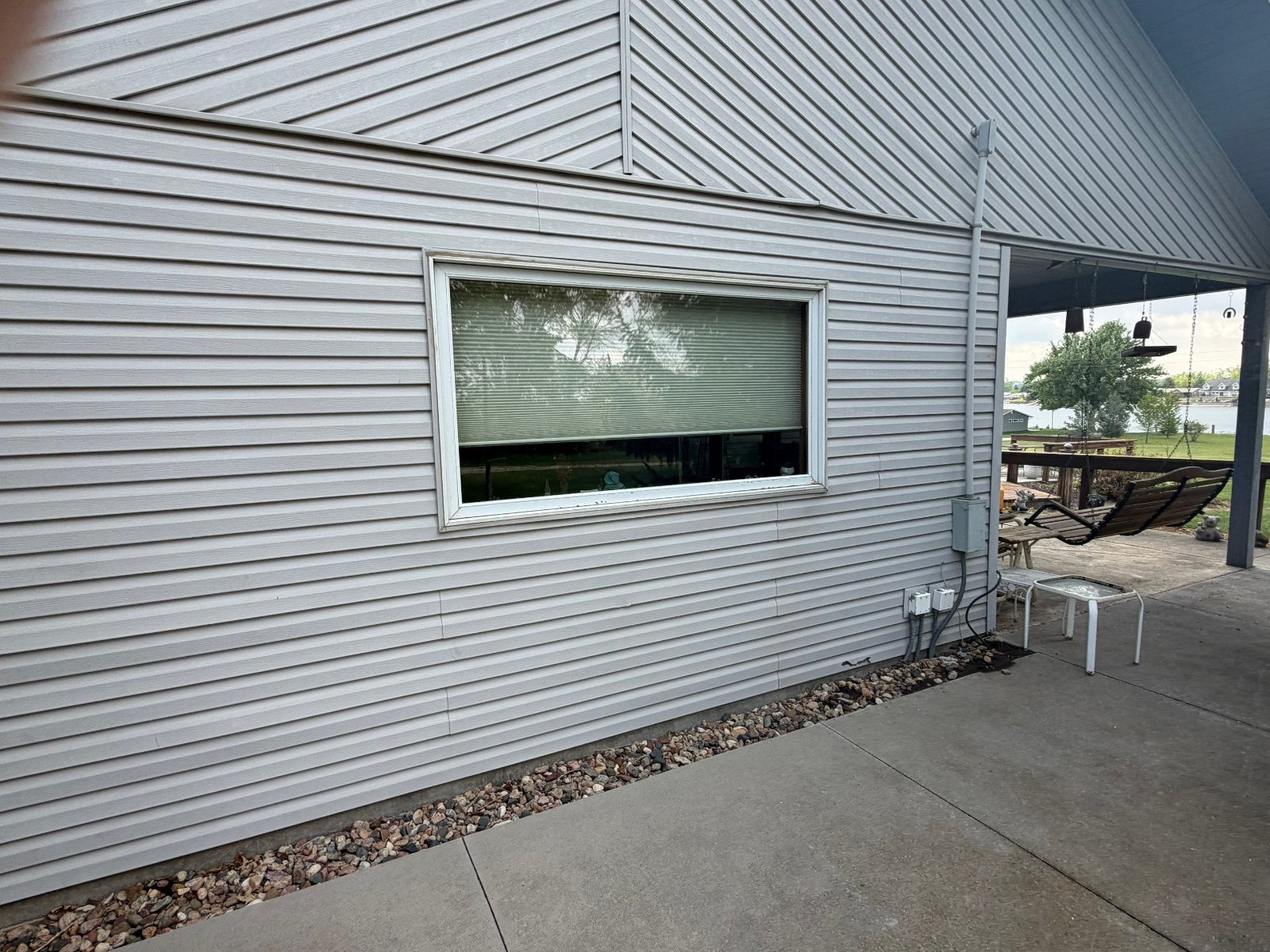 New vinyl siding installation on home in Bellevue, NE by KO Roofing & Storm Repair