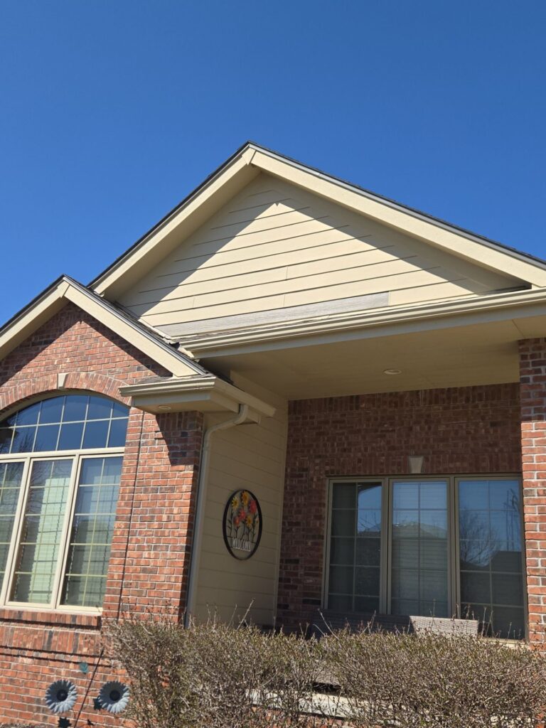 Completed siding replacement on a home in Papillion, Nebraska by KO Roofing & Storm Repair